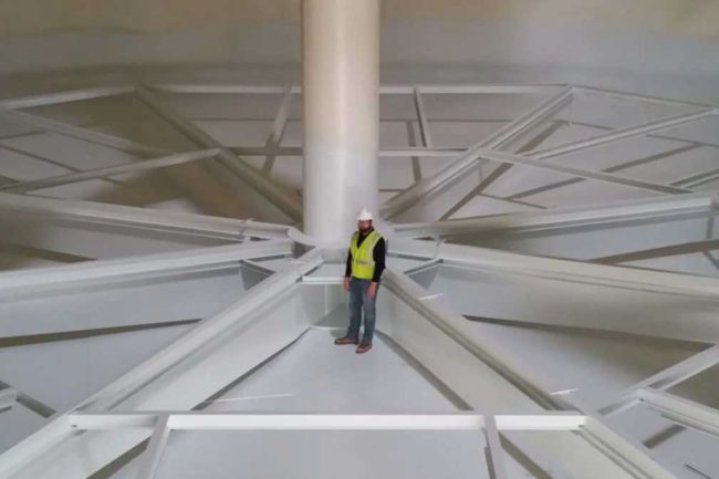 Man standing on thermal energy storage system