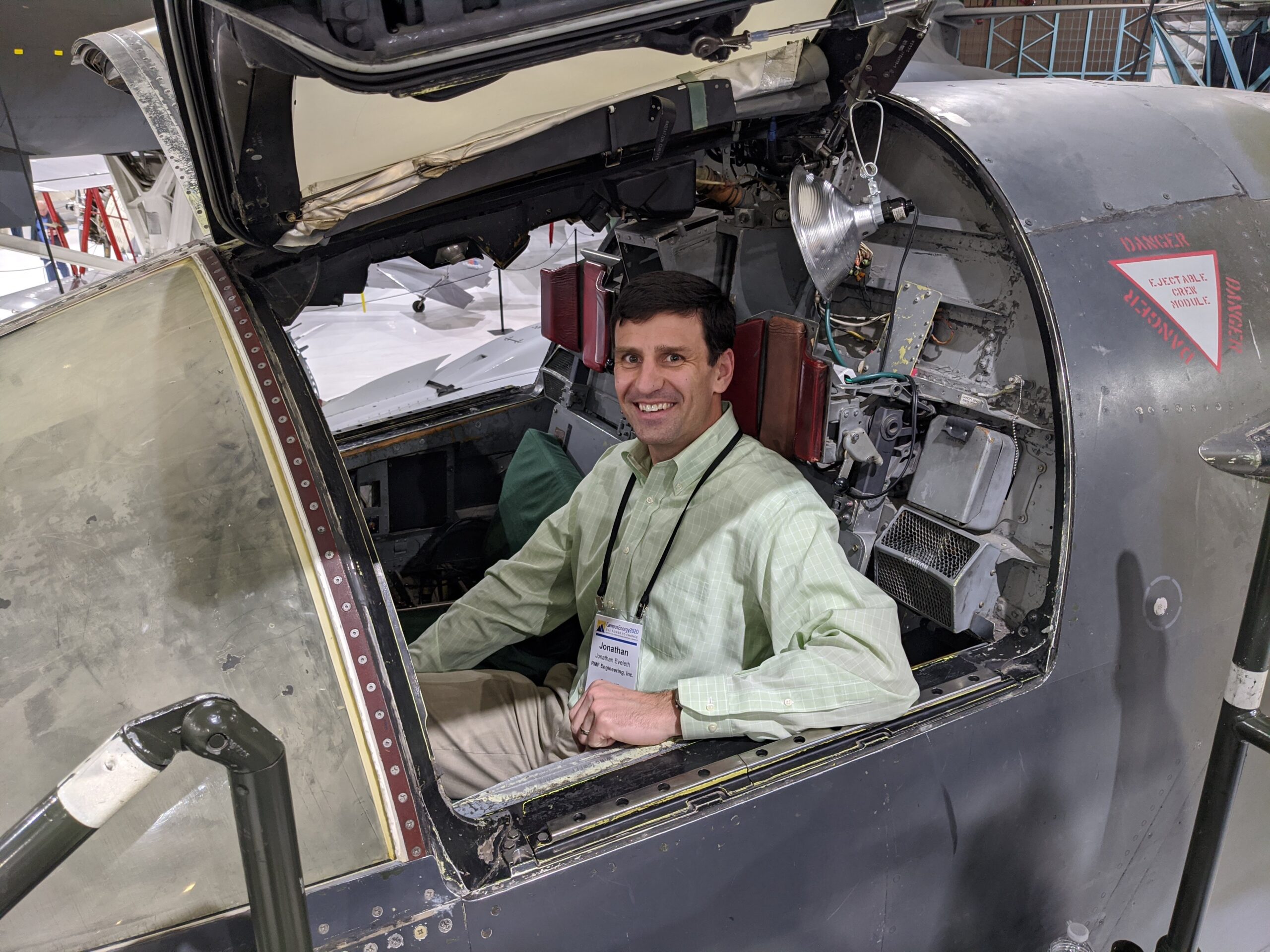 Jonathan Eveleth tours the Wings over the Rockies Air and Space Museum during the IDEA Campus Energy Conference in 2020